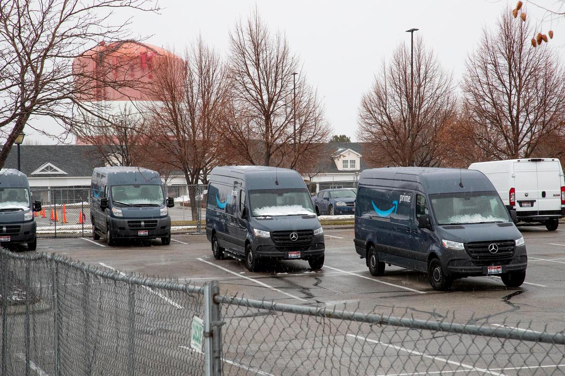 With far less traffic a large portion of the Boise Outlets parking lot is fenced off for a fleet of Amazon delivery vans.
