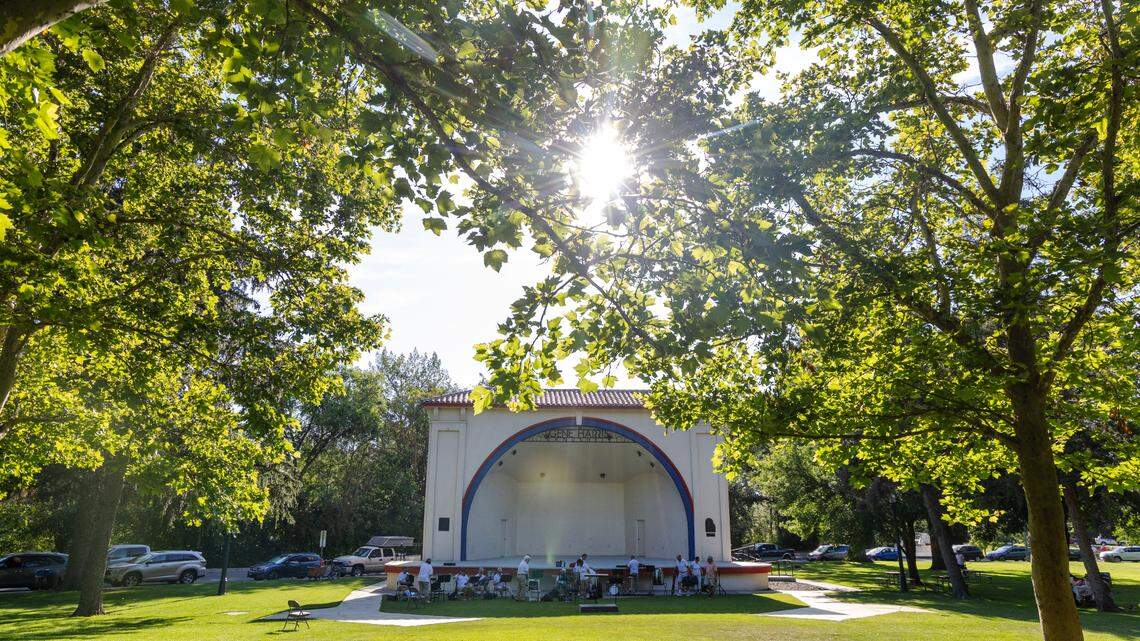 The sun shines over the Gene Harris Bandshell at Julia Davis Park before the start of the Boise Community Band concert, Wednesday, July 19, 2023.