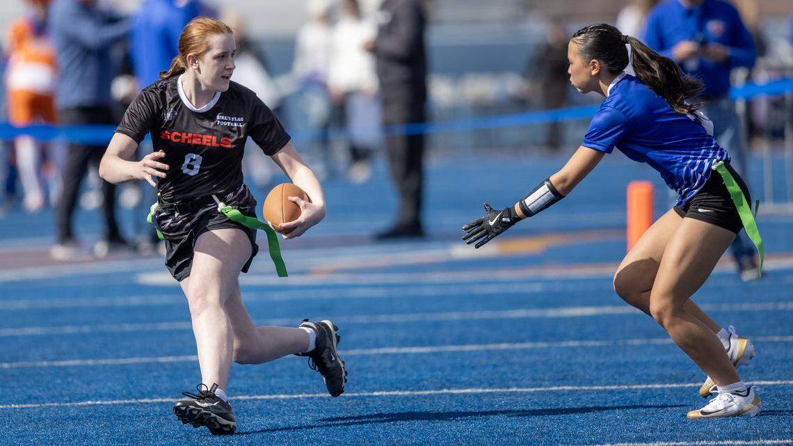 Girls on the Rocky Mountain flag football team play and exhibition game on the Blue turf of Albertsons Stadium organized by Optimist Youth Football at the end of the Broncos' annual spring game, Saturday, April 25, 2026.