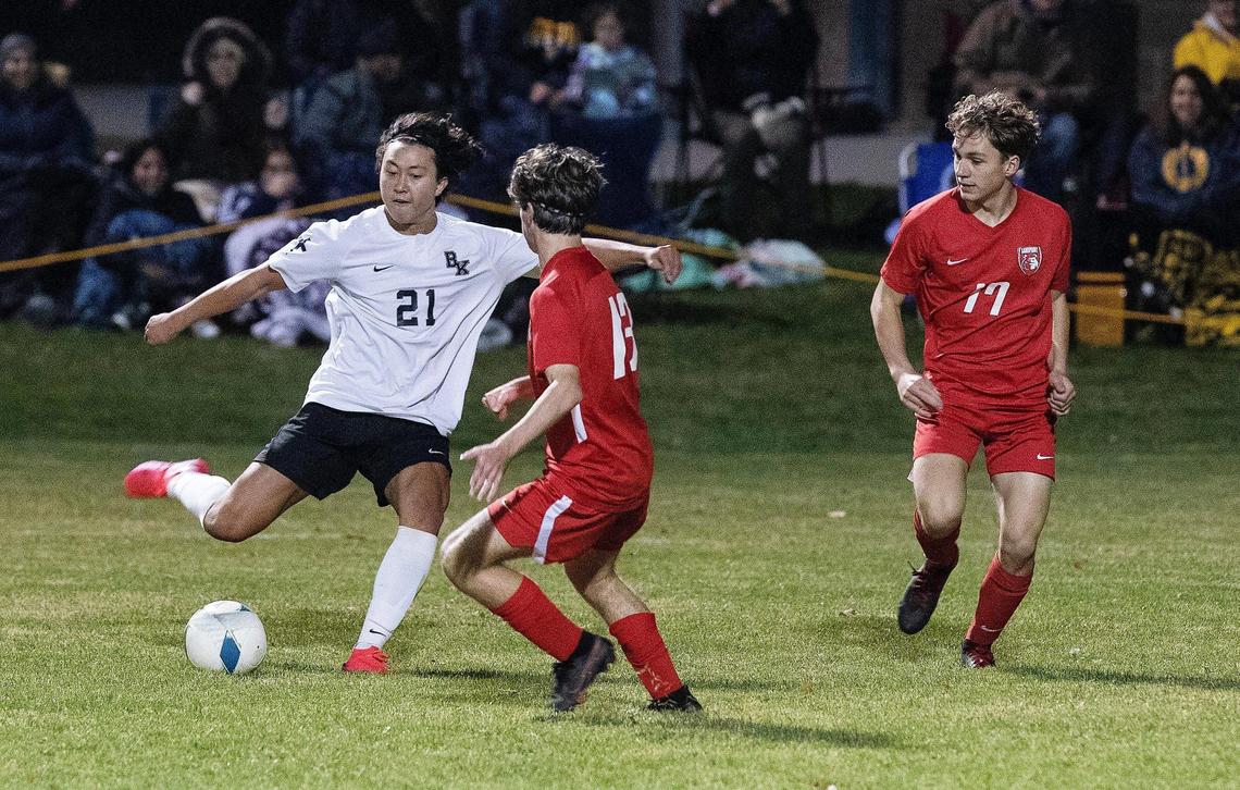 Bishop Kelly’s Shawn Cabus scores from the top of the 18-yard box to give the Knights a 3-0 lead in the 4A boys soccer championship Saturday against Sandpoint.