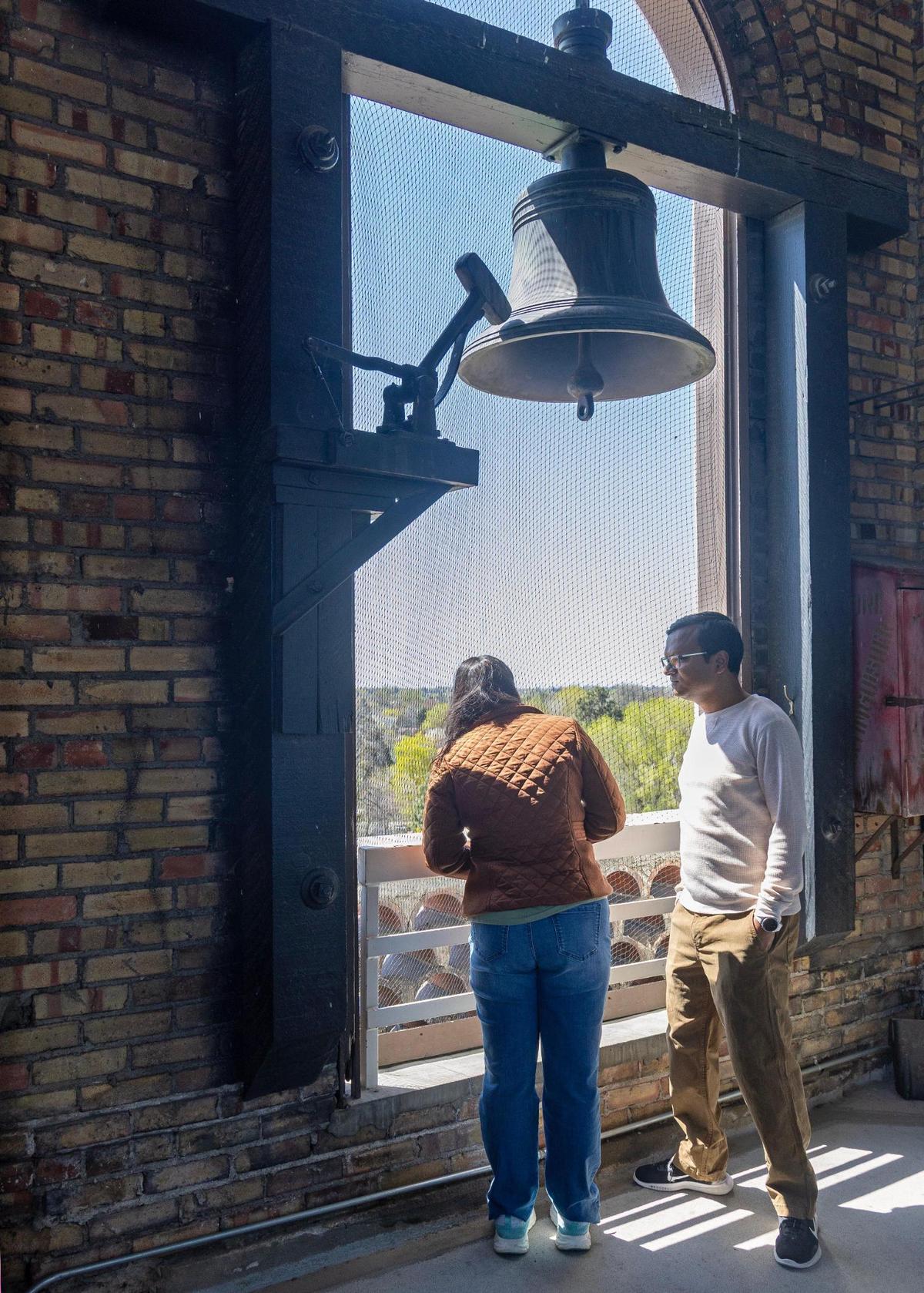 People look at the view from the bell tower of the Boise Depot.
