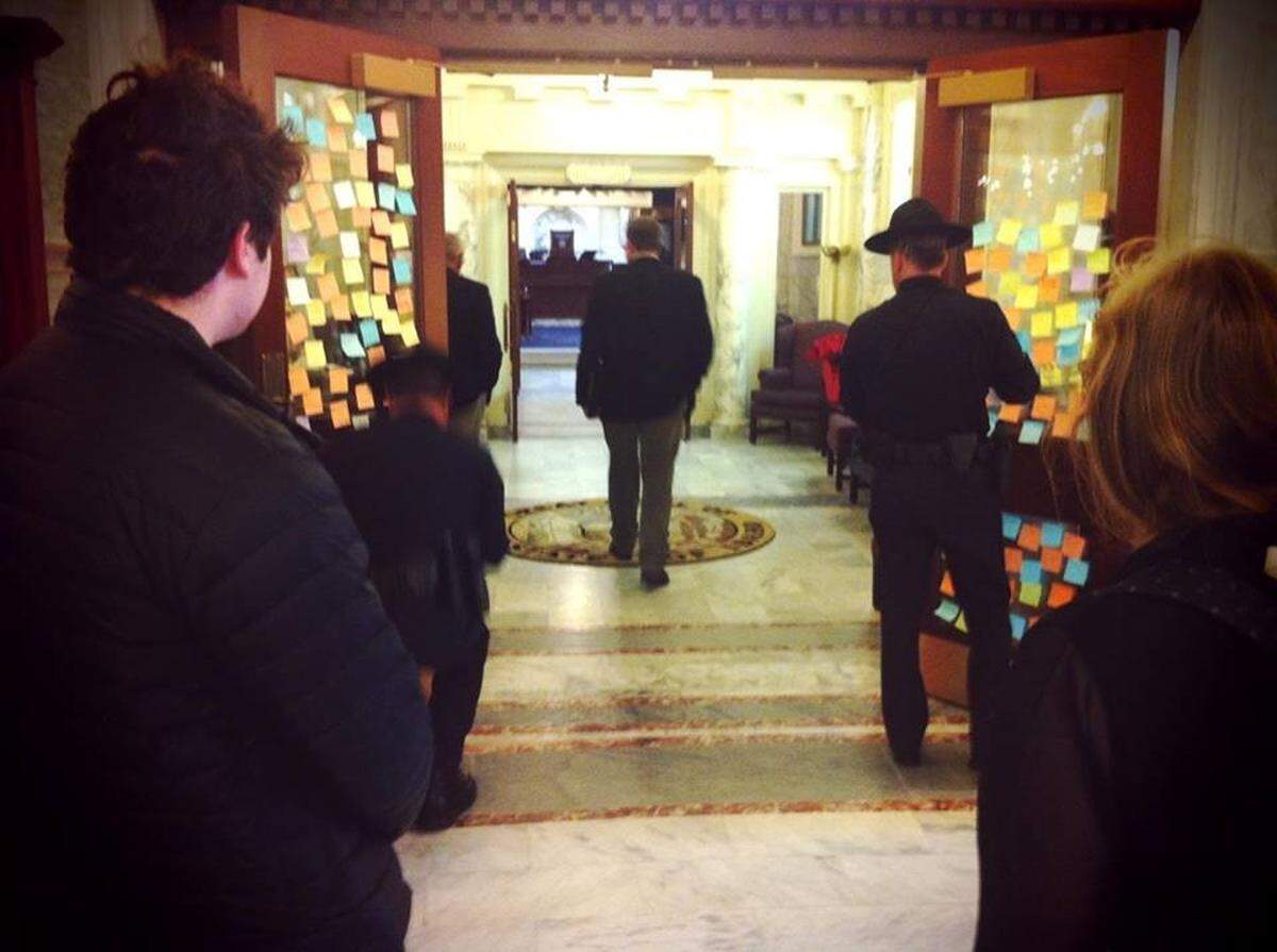 Frustrations over not receiving a hearing manifested into a sticky note campaign. On each sticky note a person wrote their story or experience.