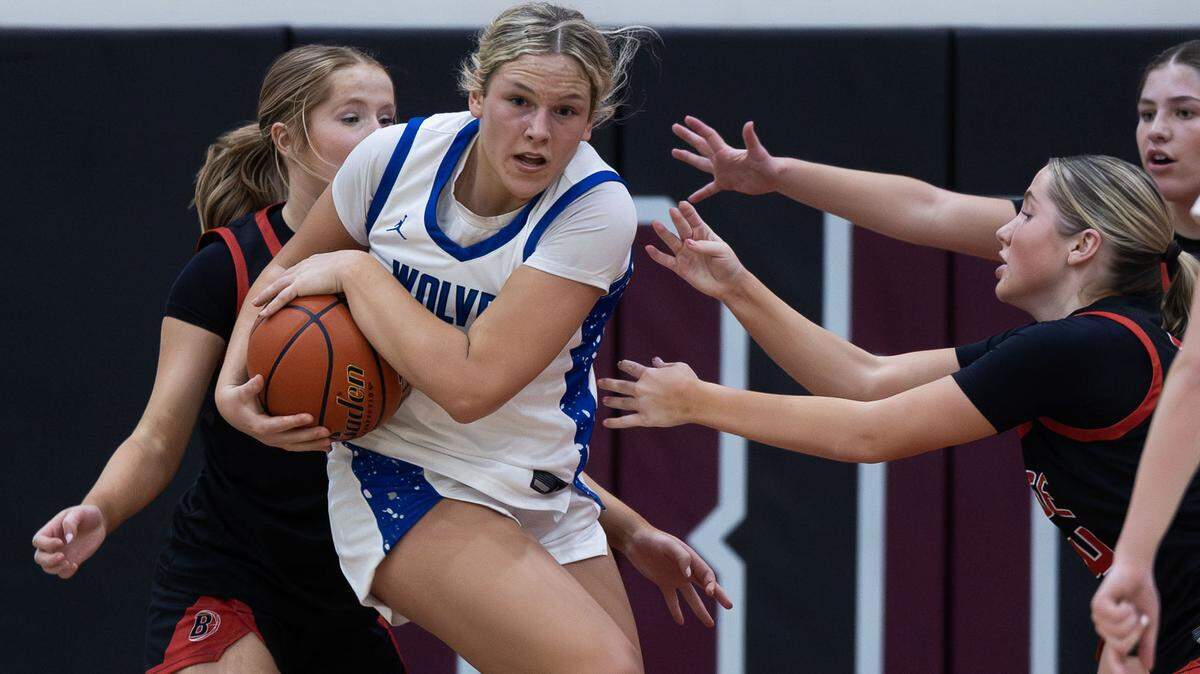 Timberline forward Fanci Sackett secures the ball from Boise in the first round of the 6A District Three girls basketball tournament hosted at Centennial High, Thursday, Feb. 5, 2026.