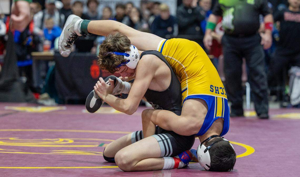 Nampa junior Ryan Hirchert, left, will contend for his third straight state title as the top seed in 6A’s 106-pound division.