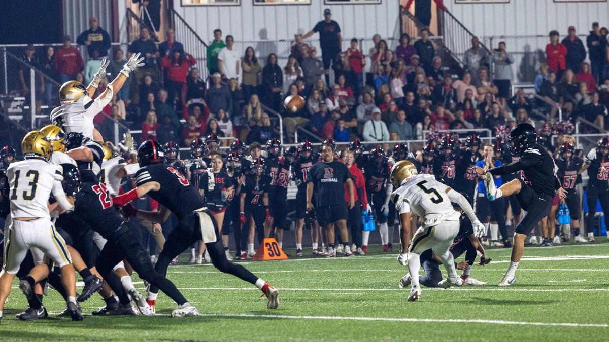 Boise senior Travis Bartich kicks a 31-yard field goal with 8 seconds left in the season opener against rival Capital, winning the game 36-33 in a game moved to Homedale High School due to poor air quality in Boise.