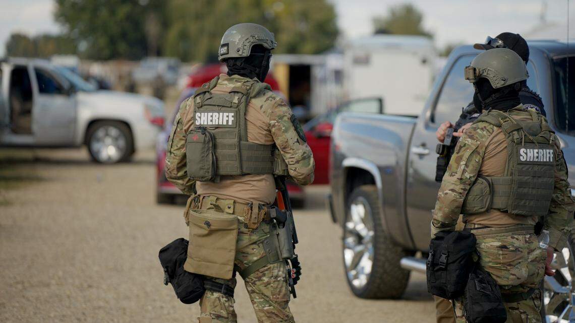 Deputies from the Canyon County Sheriff’s Office during a raid at La Catedral Arena in Wilder, that resulted in the arrest of five people on criminal charges and dozens of others on immigration violations. The Sheriff's Office was one of nearly a dozen law enforcement agencies that responded on Oct. 19.