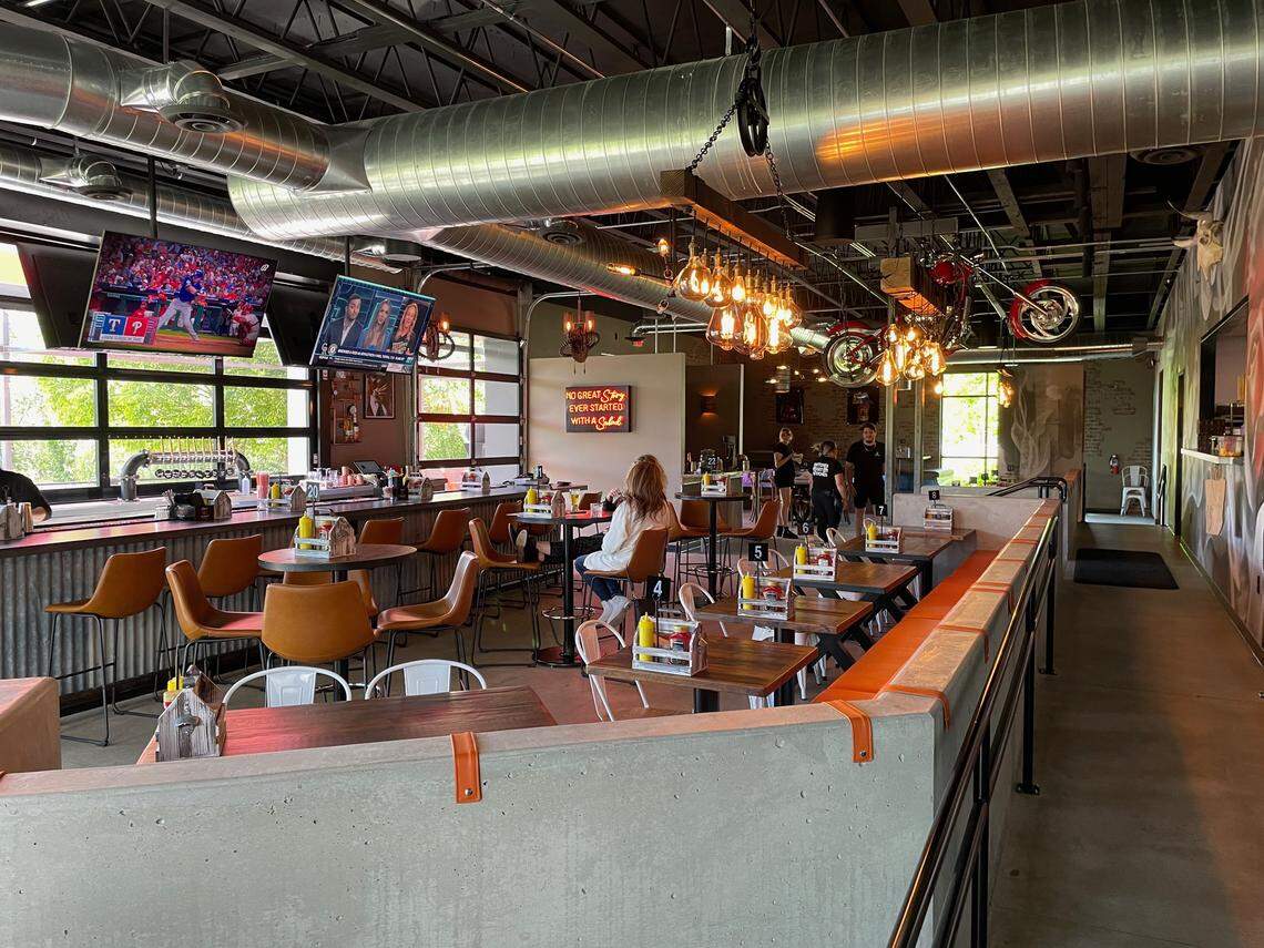 With two garage doors that open to an outdoor patio overlooking a pond, Sid’s Garage has arrived in East Boise.