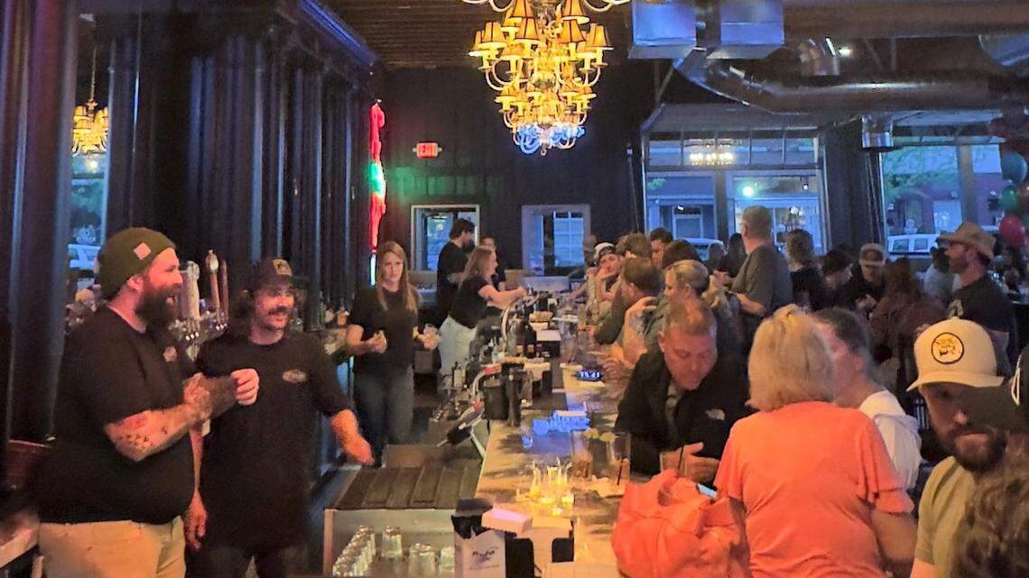 A single, sprawling bar serves customers inside the 127 Saloon.