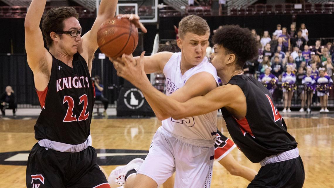 Cody Moosman, center, was one of two first-team all-conference picks for Cascade.