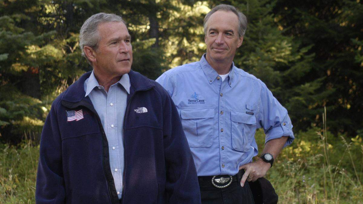 Former Idaho Gov. Dirk Kempthorne, right, has been diagnosed with colon cancer. He visited with President George W. Bush at Tamarack Resort in 2005, before later becoming Bush’s secretary of the interior from 2006 to 2009.