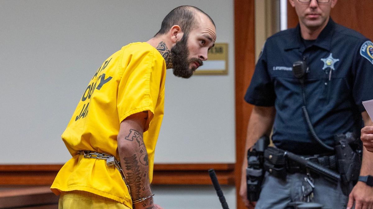 Nicholas Umphenour appears in 4th District Court for arraignment on Wednesday. Accused of several felonies in the shooting of correction officers and the escape of an Idaho prisoner, Umphenour stood silent in court, refusing to enter a plea.