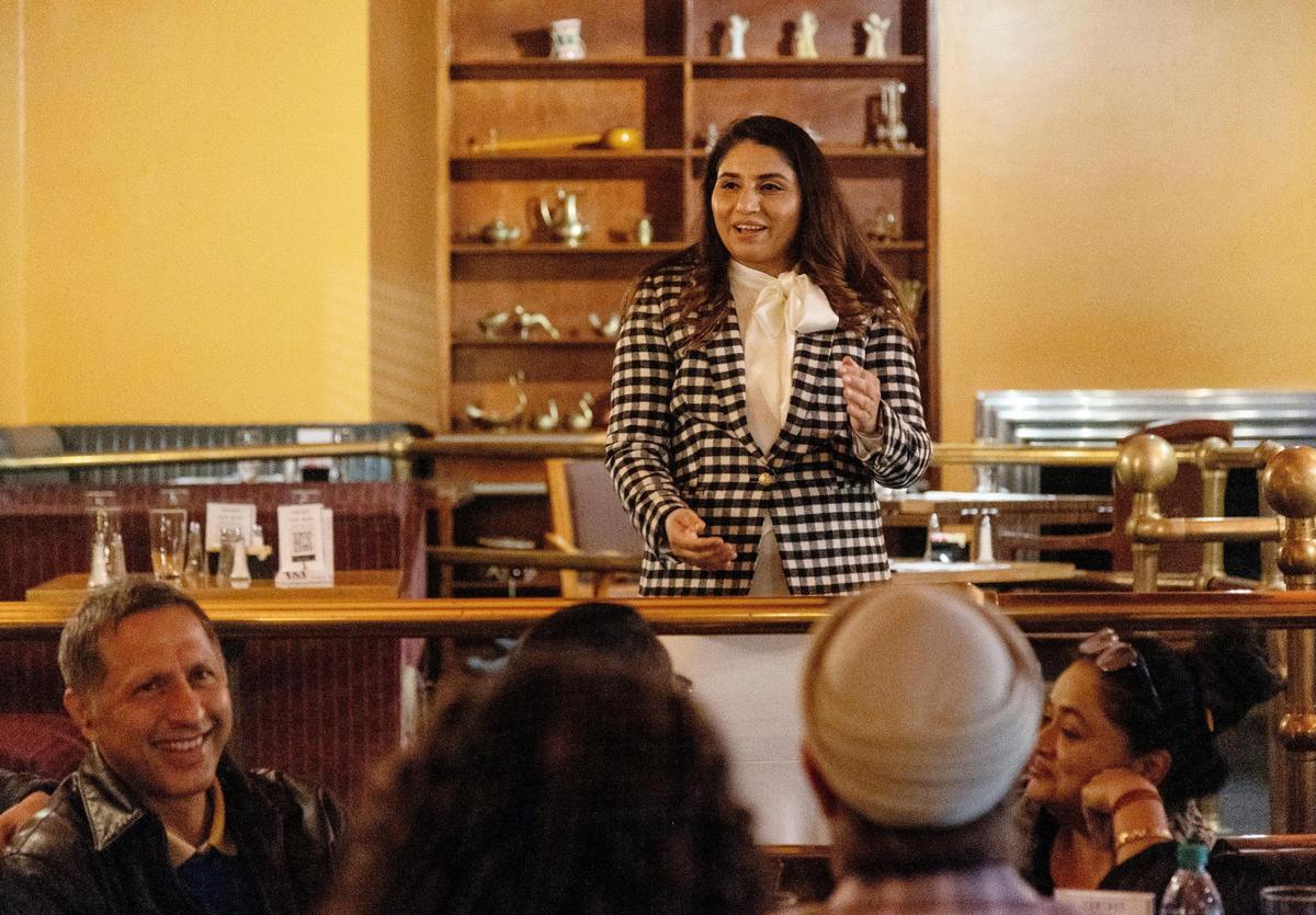 Simran Kaur, whose parents own Boise Indian restaurant Bombay Grill, speaks about the accomplishments of American Sikhs during a special dinner event for Sikh Awareness and Appreciation Month at the restaurant on Monday, Nov. 29, 2021.