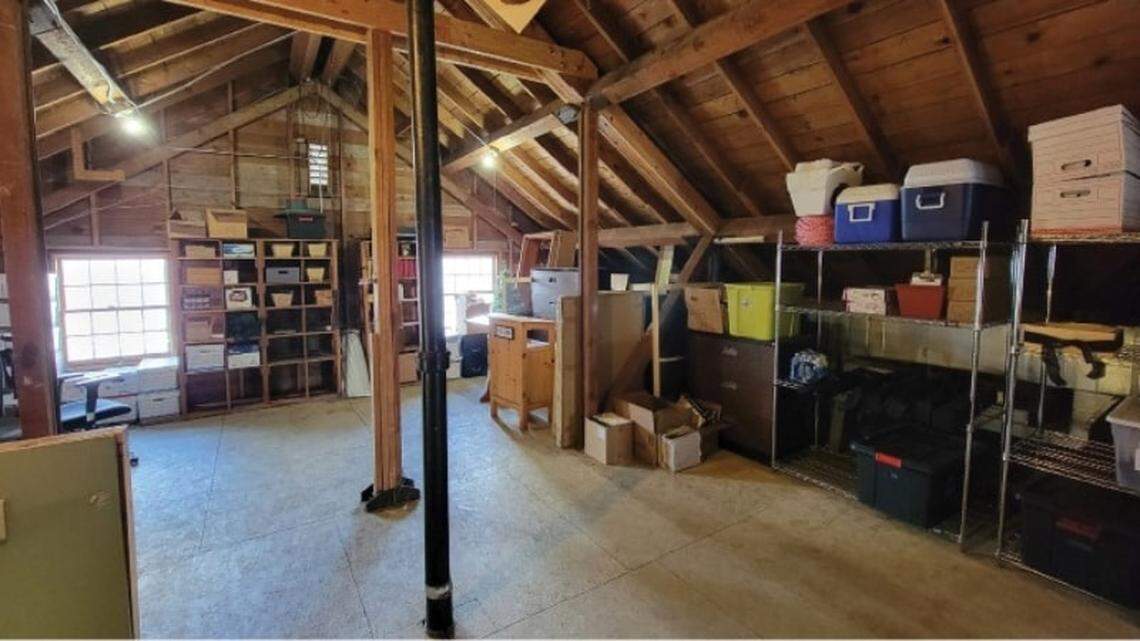 Plans call for replacing the building attic, shown here, with a reading loft.