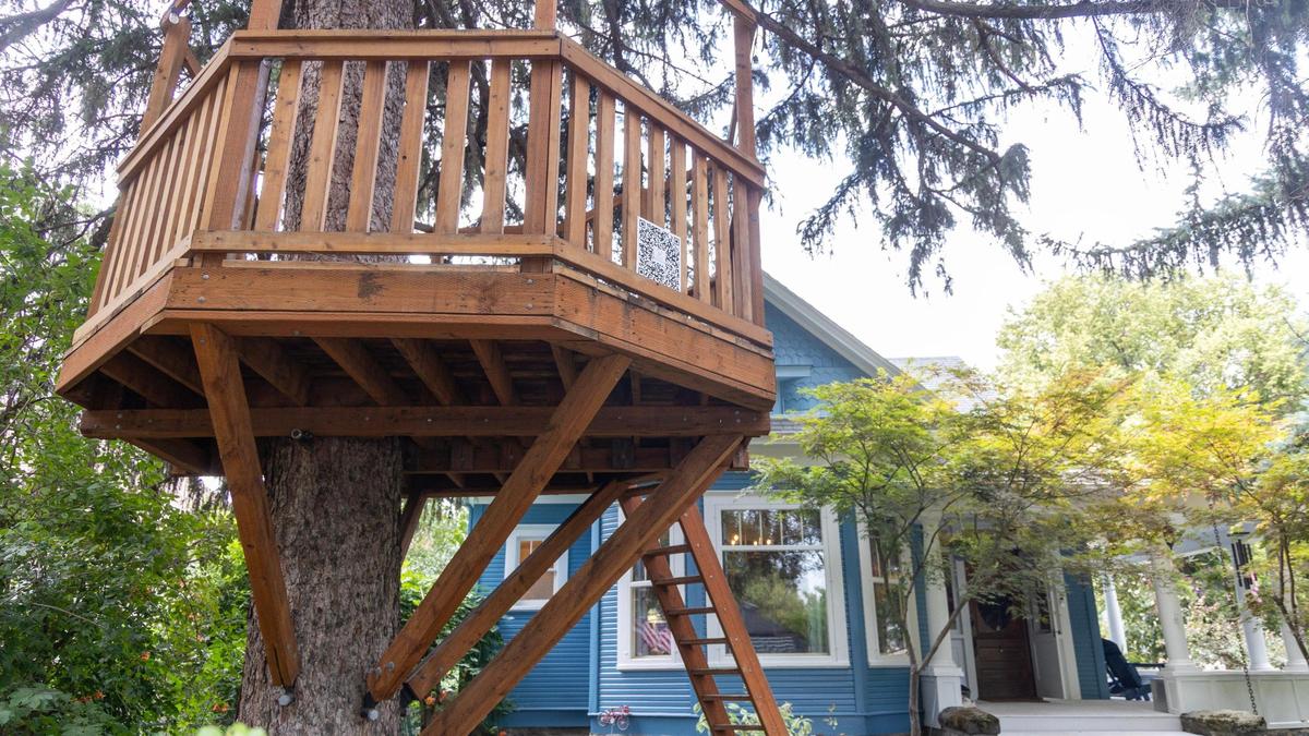 Inside, the house has tall ceilings and a remodeled kitchen.