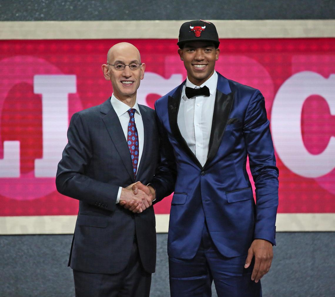 Boise State's Chandler Hutchison poses with NBA Commissioner Adam Silver after he was picked by the Chicago Bulls in the NBA Draft on Thursday.