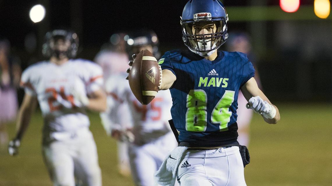 Mountain View wide receiver Leyton Smithson celebrates a long touchdown run in the third quarter of the Mavericks’ blowout win over Post Falls in Friday night’s 5A quarterfinals. Mountain View’s 57-0 victory sets up a 5A semifinal showdown with Highland next week.