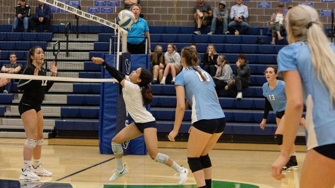 Skyview libero Melissa Eyer passes the ball in the third set of the 5A District Three Tournament championship volleyball match Thursday at Mountain View High. The Hawks swept Eagle 25-13, 25-20, 25-11.