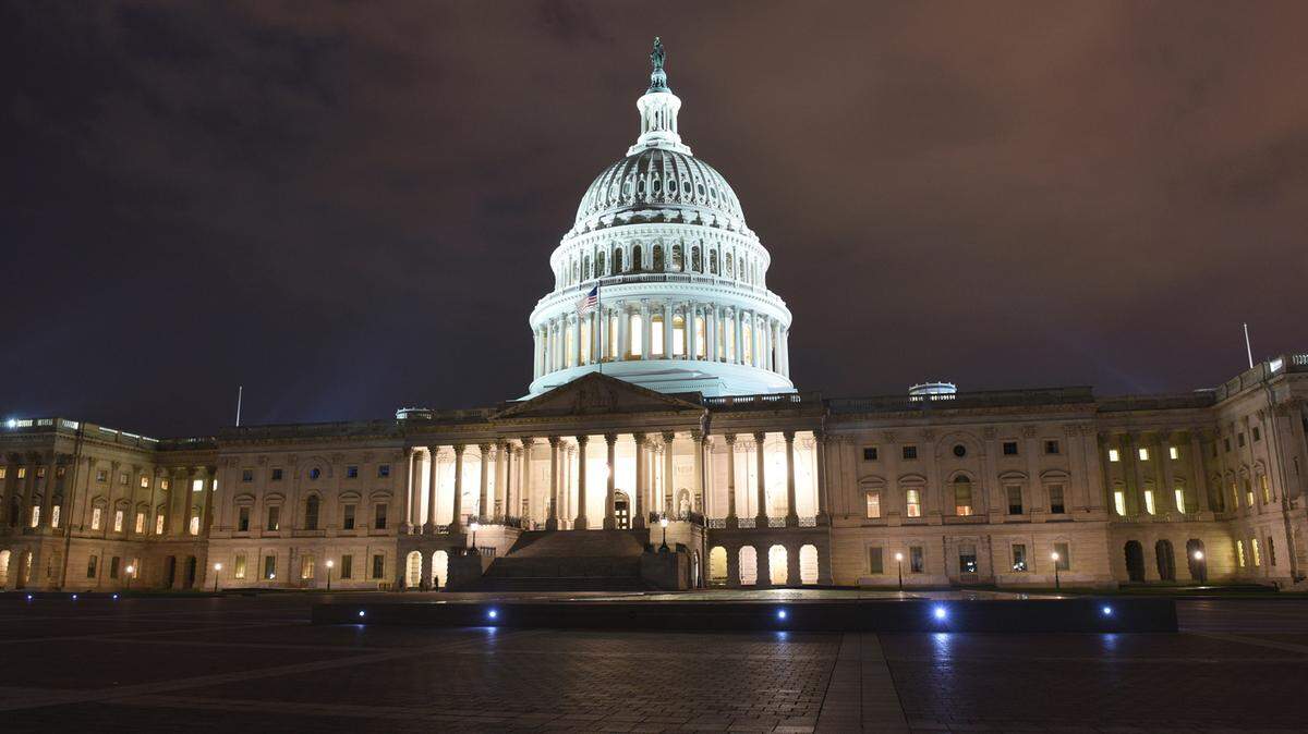 United States Capitol Building at night Getty Images | Royalty Free