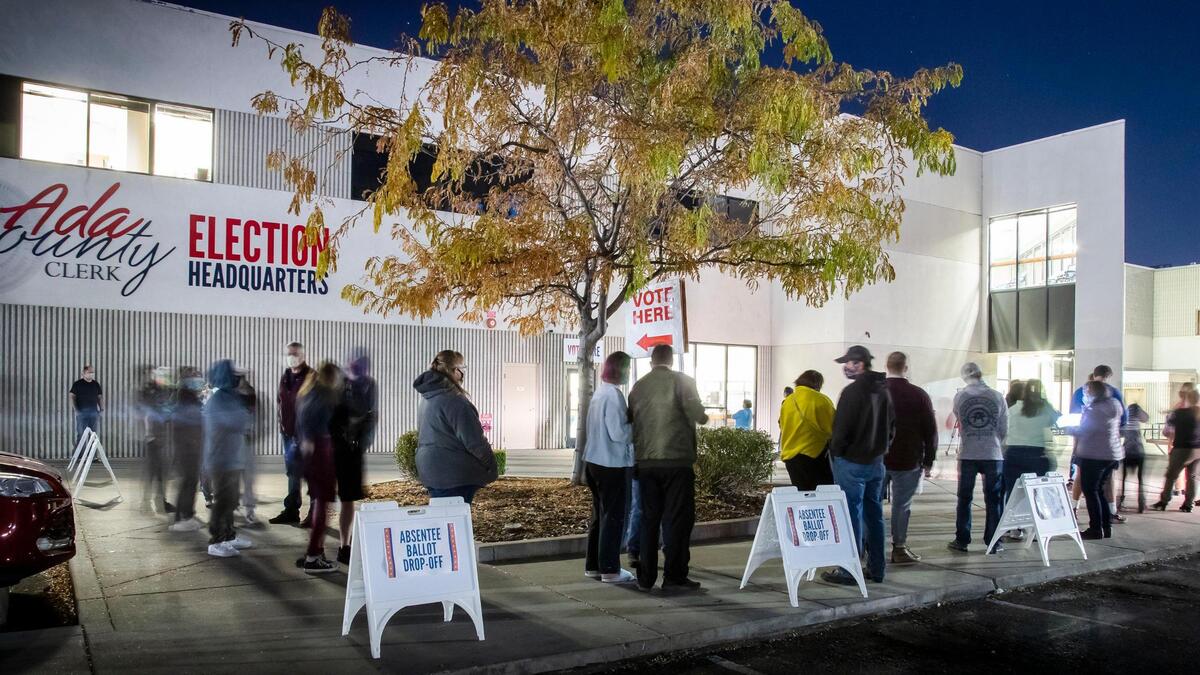 With about an hour before polls close, voters wait in a long line at Boise precinct 1701 at the Ada County Election Headquarters on Tuesday, Nov. 3.