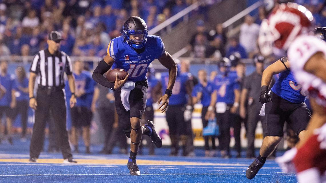 Boise State quarterback Taylen Green keeps the ball in the second half of the Broncos’ 40-20 win over Fresno State on Oct. 8.
