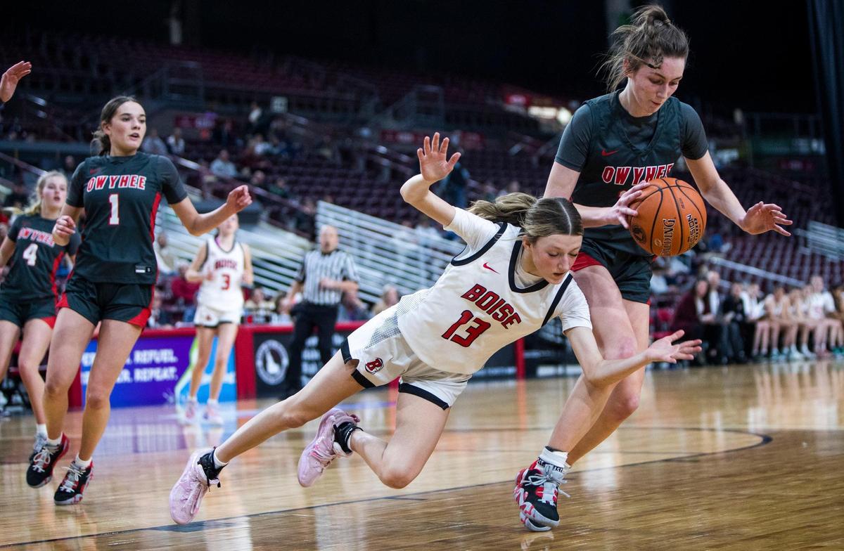 Boise guard Avery Patricco dives for the ball but Owyhee’s Mikale Roy grabs it Thursday.