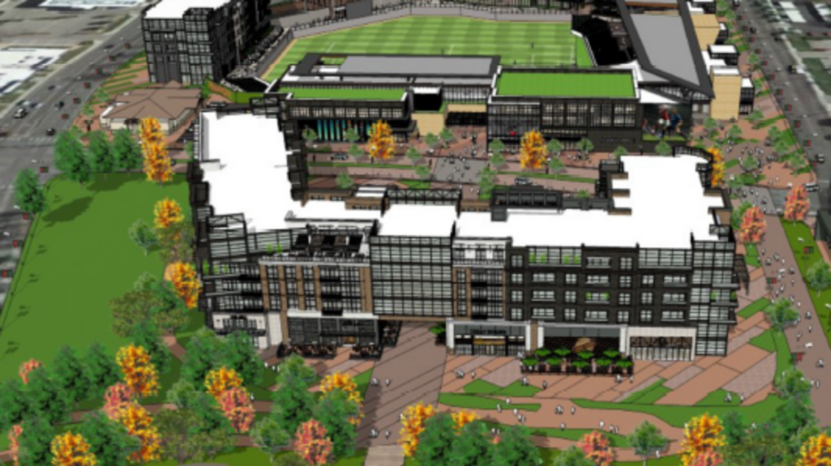 This artist's rendering looks north with the Boise River at bottom, a 240-unit apartment or condo building in the foreground and the proposed stadium behind it. More apartments or condos are on the left side of the stadium, and offices are in the back with terraces overlooking the field.