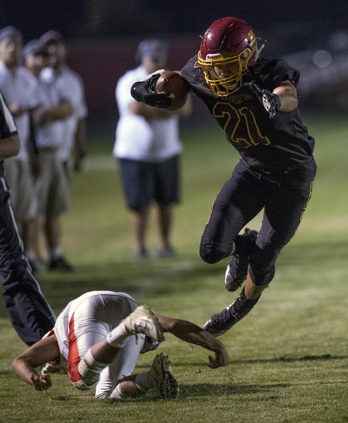 Columbia wide receiver Jeremiah Brent evades a tackle in the first meeting against Nampa this fall. The Wildcats travel to Nampa for a rematch in the 4A quarterfinals Friday.