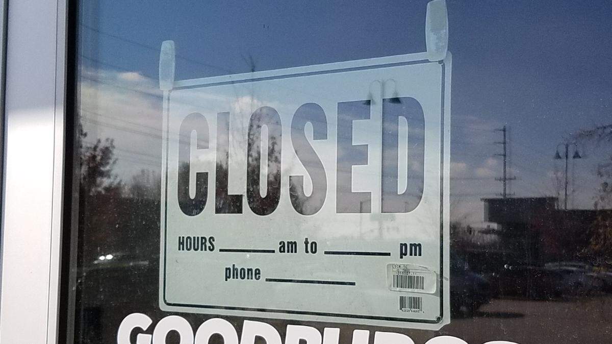 A closed sign is taped onto the door at Good Burger at 7610 W. State St. in Boise.