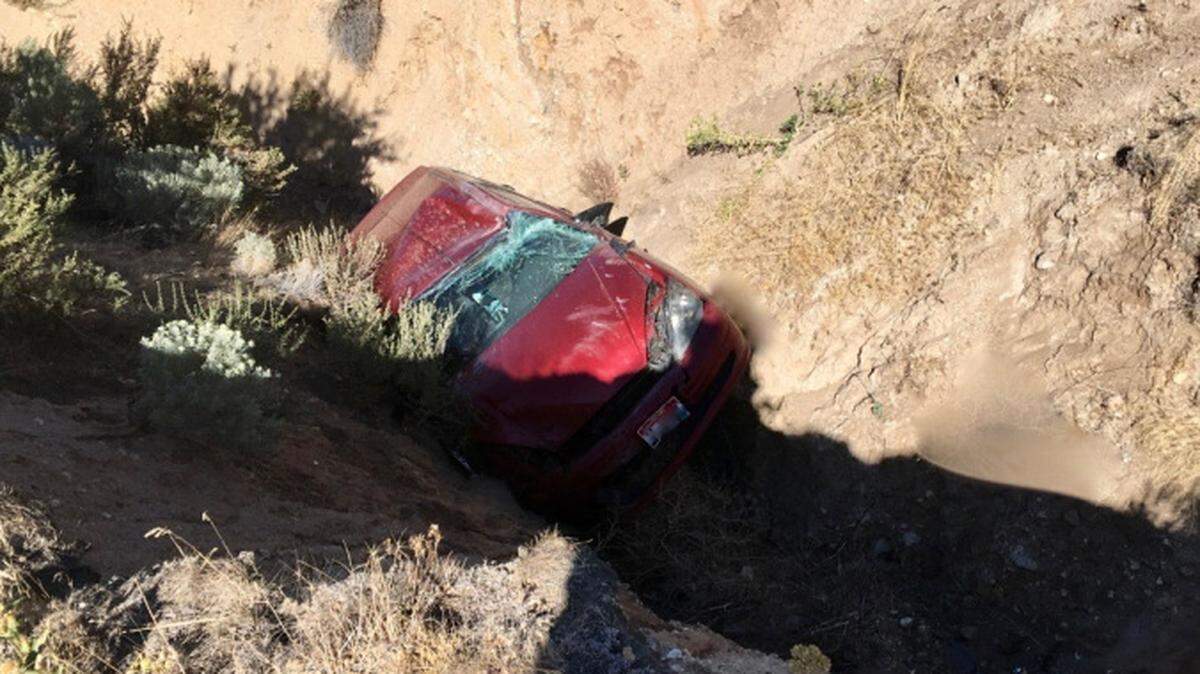 Ada County Sheriff’s Office is looking for information on who may have pushed this Ford Focus into a ravine near Table Rock last month.