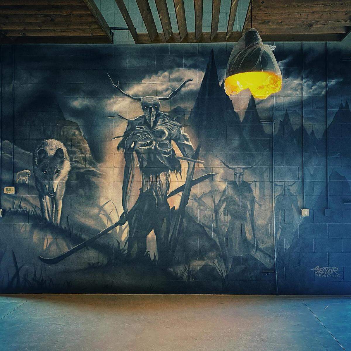 Barbarian’s new taproom in Garden City includes a mural from local artist collective Sector Seventeen.