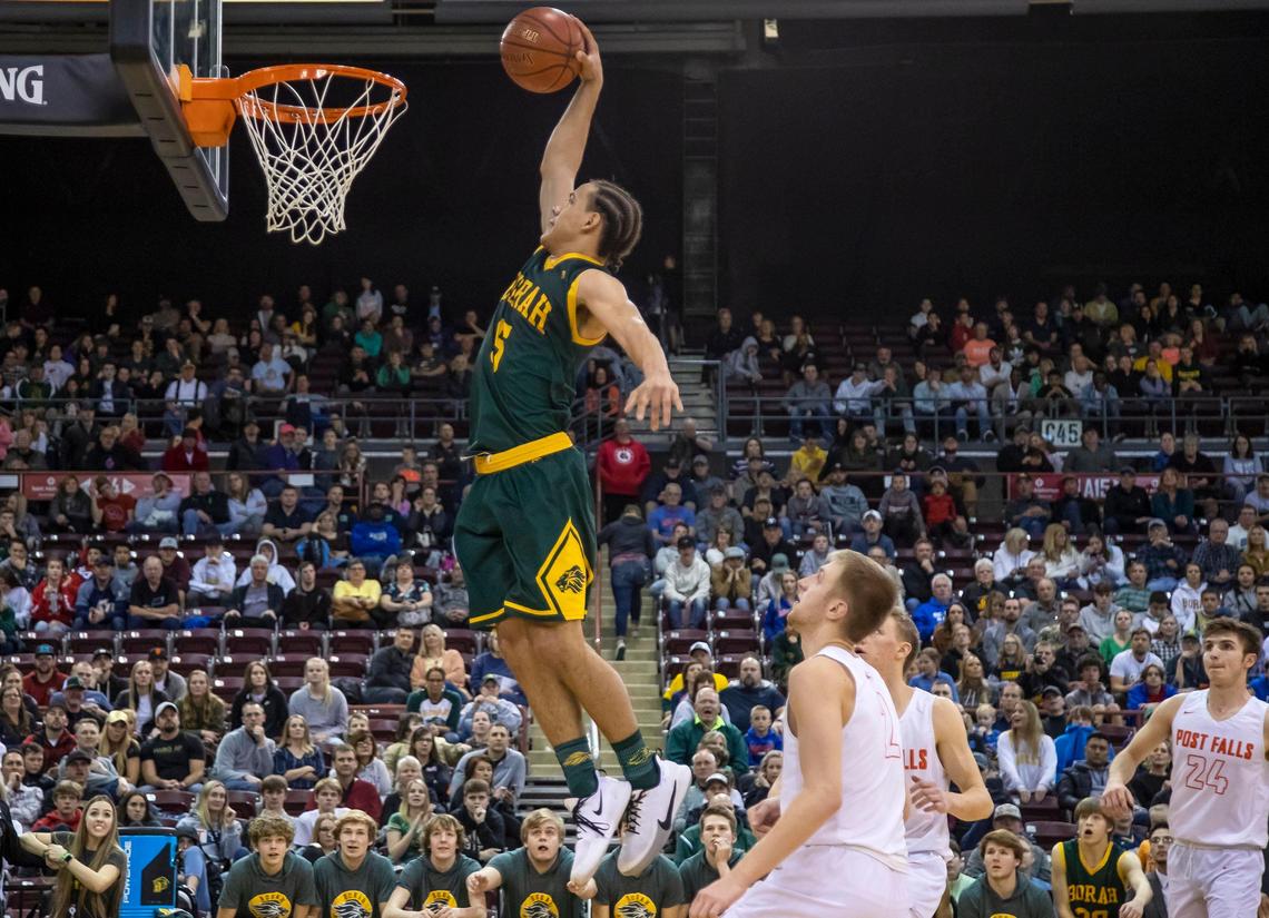 Borah senior Isaac Dewberry puts an exclamation point dunk on the Lions’ lead over Post Falls late in the fourth quarter during the 5A state boy’s basketball championship Saturday, March 7, 2020 at Ford Idaho Center in Nampa.