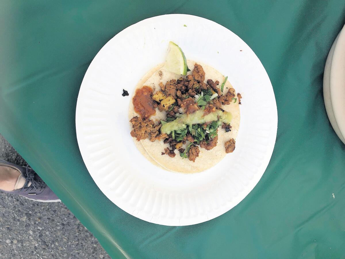 The street tacos at Tacos San Mateo are served on doubled-up corn tortillas. 