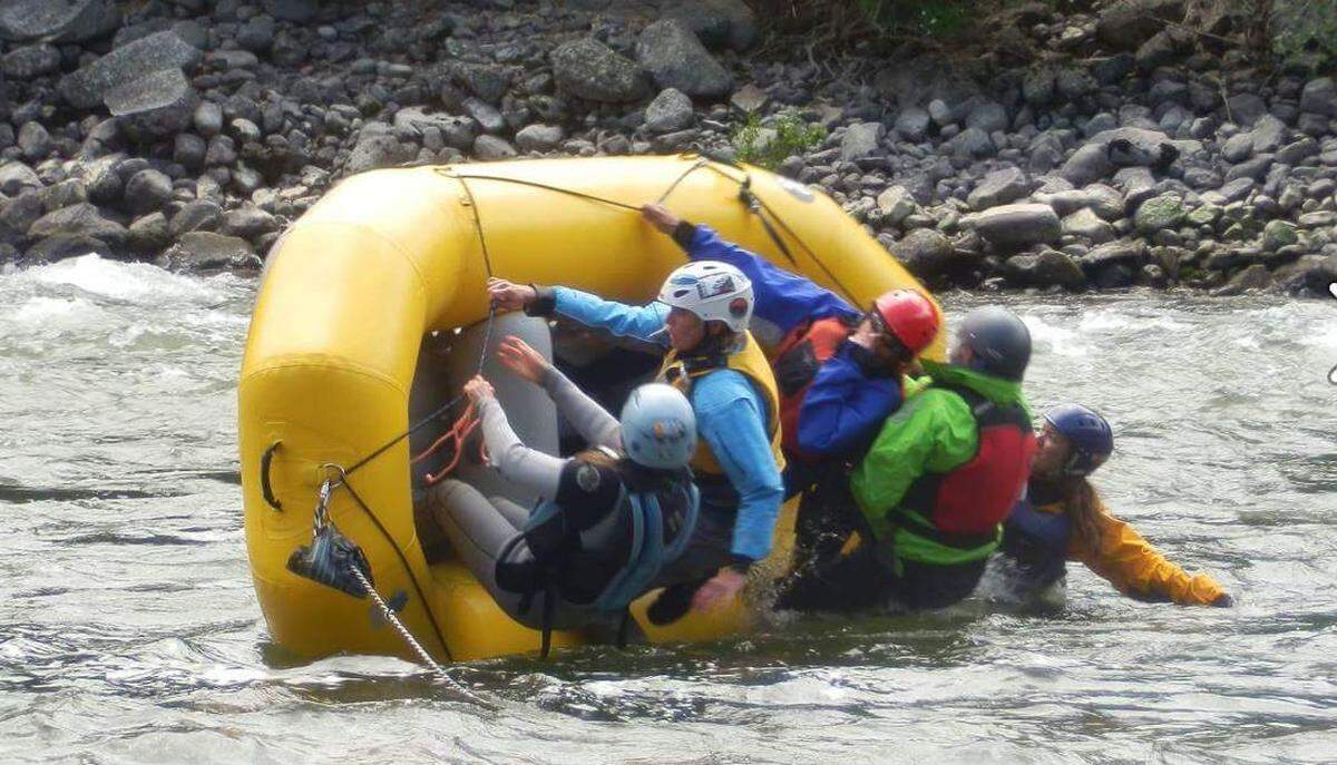 Women learn to right overturned rafts and ride out rapids from the water during Whitewater River Chicks’ Flip N Swim clinics, held each summer. Vivian Chan, a Boise realtor, organized the clinics after a harrowing whitewater experience years ago.