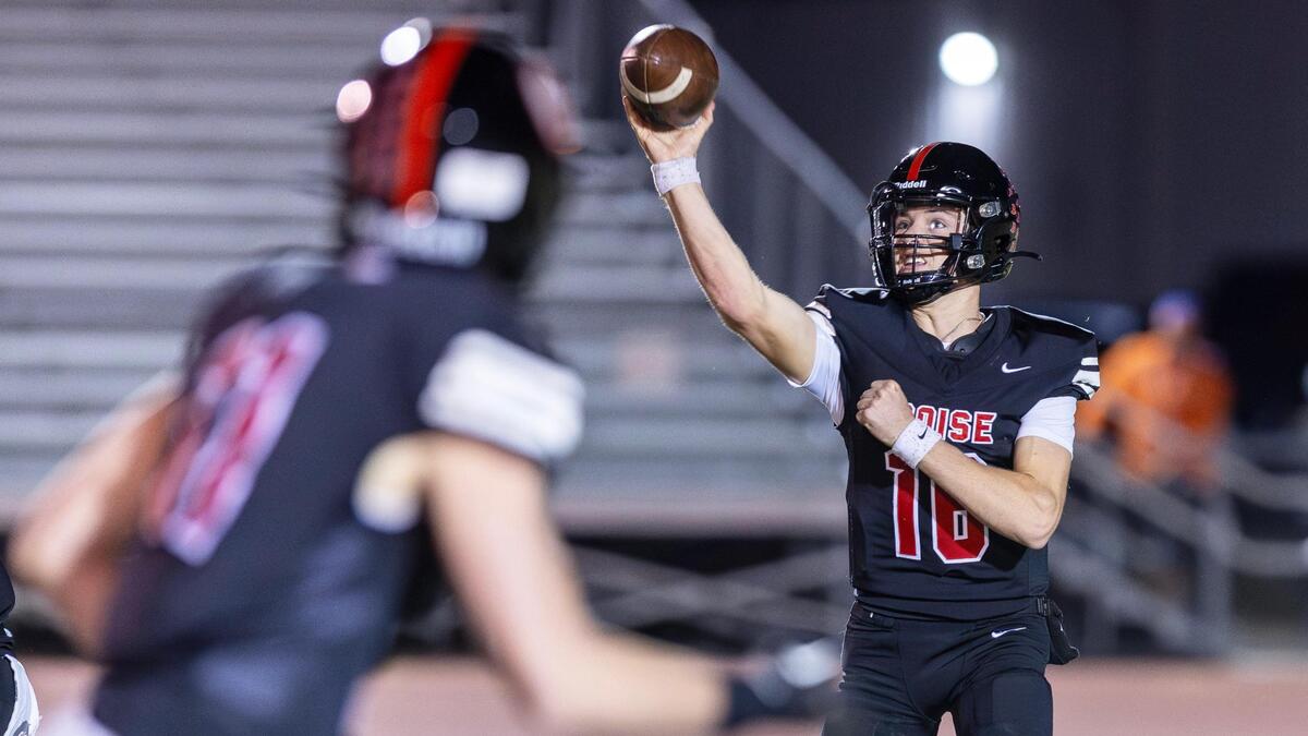 Boise quarterback Trevor Schoolfield fires a pass to Will Gebert on Friday night at Dona Larsen Park.