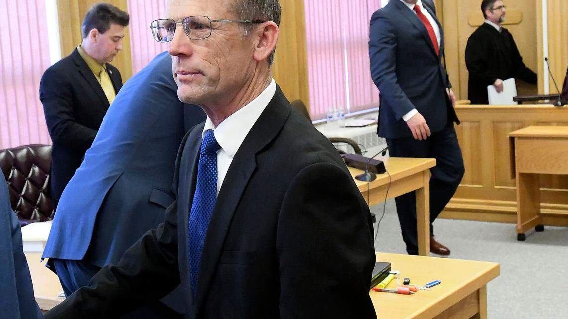 Robert Crosland leaves the courtroom during a recess in his misdemeanor animal cruelty case, Friday, Jan. 4, 2019, in Preston, Idaho. Crosland is on trial for feeding a live puppy to a snapping turtle in front of students at Preston Junior High School. (Eli Lucero/Herald Journal via AP)