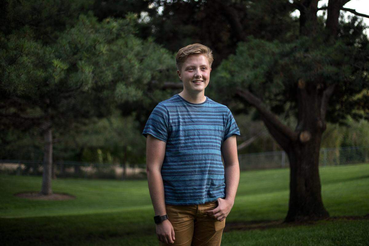 Beckett Jones, 20, stands for a portrait at Orval Krasen Park in Eagle on Aug. 10. Jones came out as gay and then transgender to his Latter-day Saints family at 13 years old. Now, he and his mom organize activities for LGBTQ youth, their parents and their allies to bring together others facing the same obstacles.
