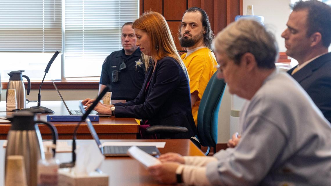 James Johnson listens as Kathy Warnock, mother of Milo Warnock, reads her victim impact statement at Johnson’s sentencing at the Ada County Courthouse for the 2023 murder of Milo Warnock. Johnson and Warnock were cellmates at the Idaho State Correctional Center.