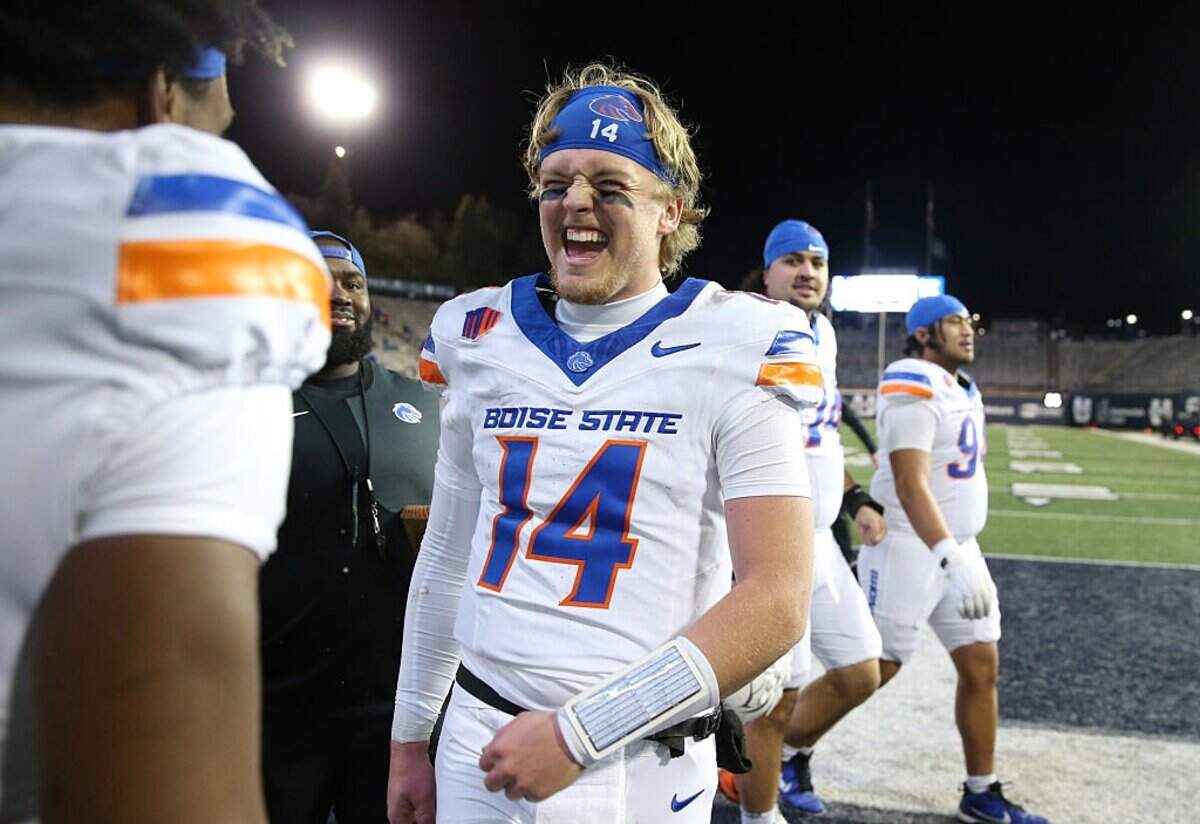LOGAN UT - NOVEMBER 28: Max Cutforth #14 of the Boise State Broncos celebrates their win against the Utah State Aggies at Maverik Stadium on November 28, 2025 in Logan, Utah. (Photo by Chris Gardner/Getty Images)