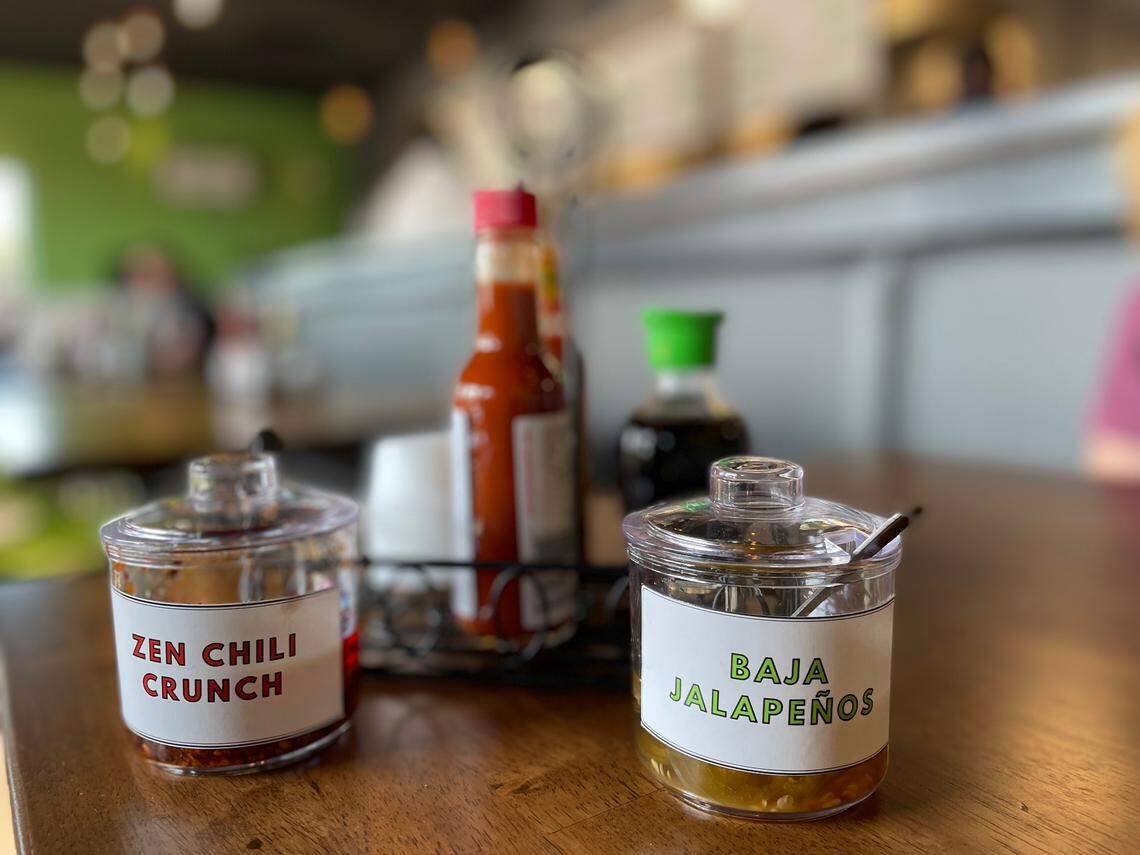Zen Chili Crunch and Baja Jalapenos are condiments made in-house at Zen Baja.