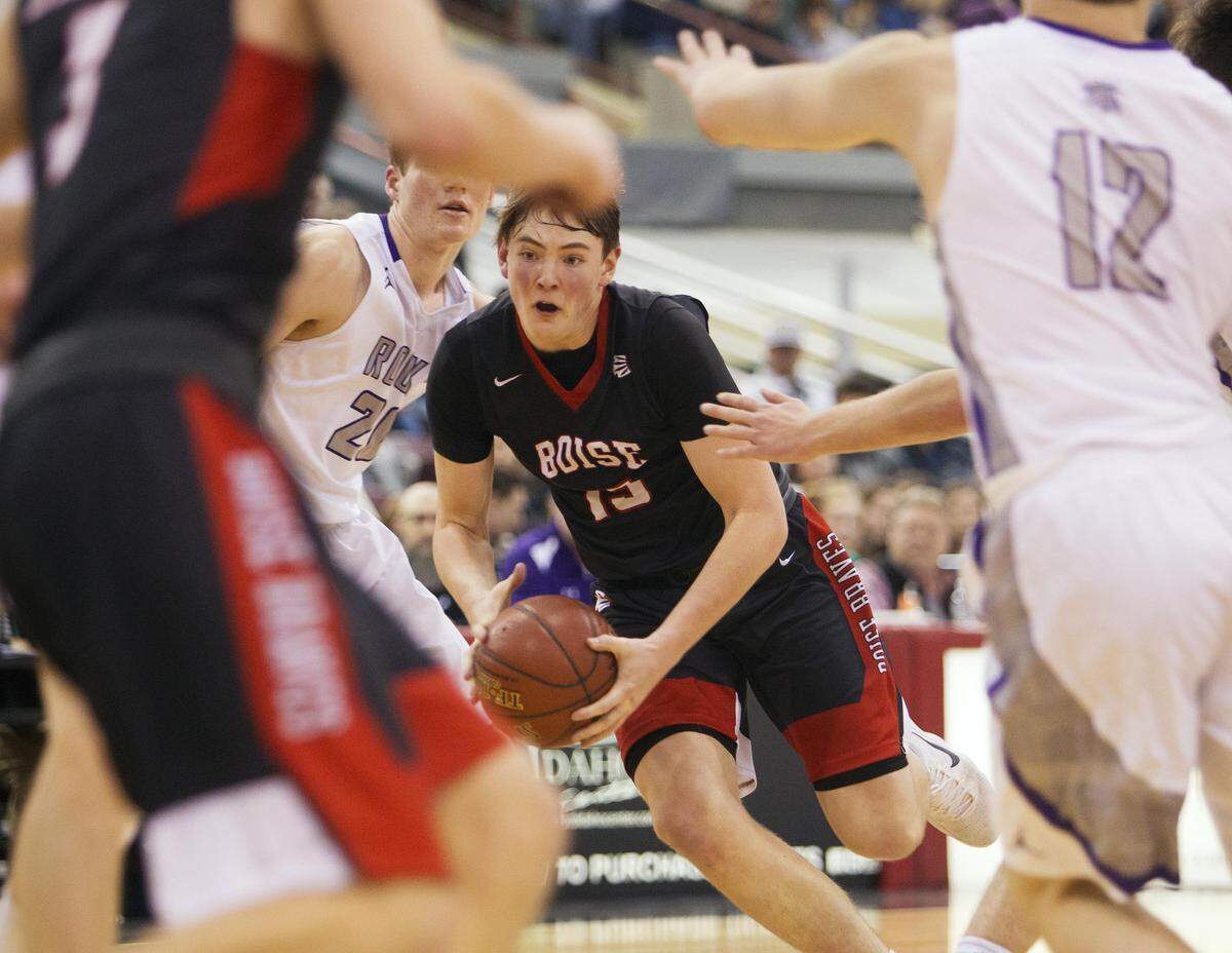 Boise’s Cole Alton finds a hole in the Rocky Mountain defense during the first round of last year’s 5A state tournament.