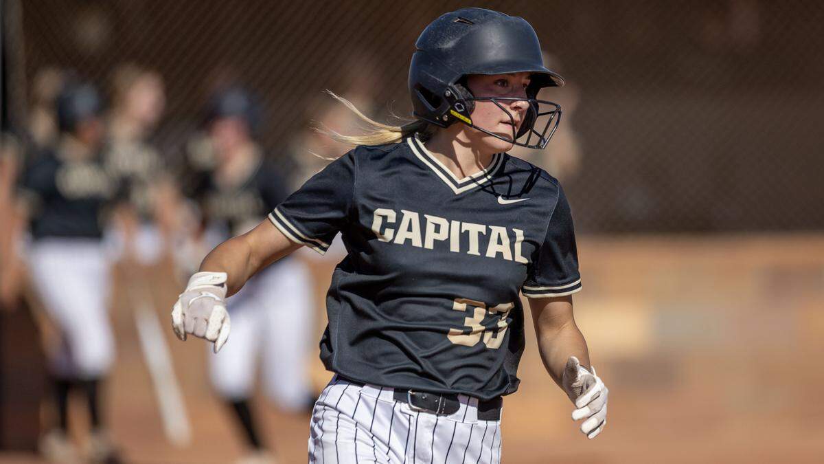 Capital senior McKenna Chavez runs to first base for a single against Rocky Mountain in the 6A District Three softball tournament at Mountain View High School in Meridian, Monday, May 4, 2026.
