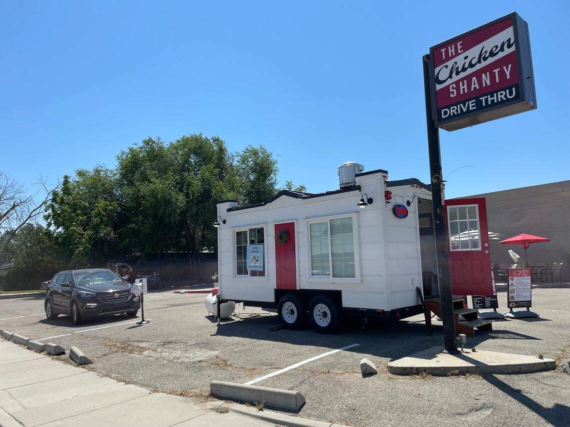 A car waits for its order this summer at the drive-thru, where employees exited the cart to take orders, then brought food back to the vehicle.