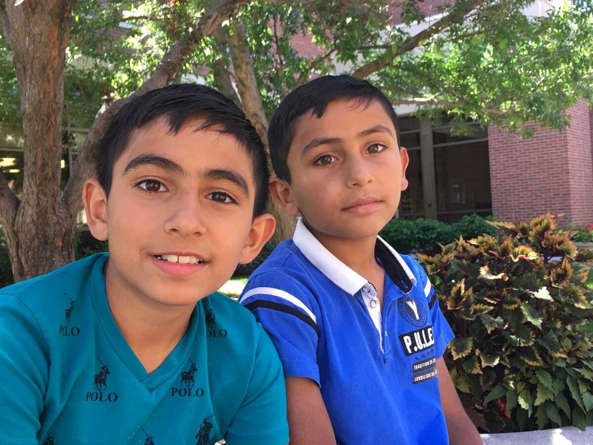 Siraj Jalil, 9, raced with his brother, Zine Jalil, 8, via ambulance to the hospital on Saturday night, June 30, after Zine was stabbed by a knife-wielding assailant. The boys disagree on how long it took to get there. But they did agree on one thing: It was a really fast trip.