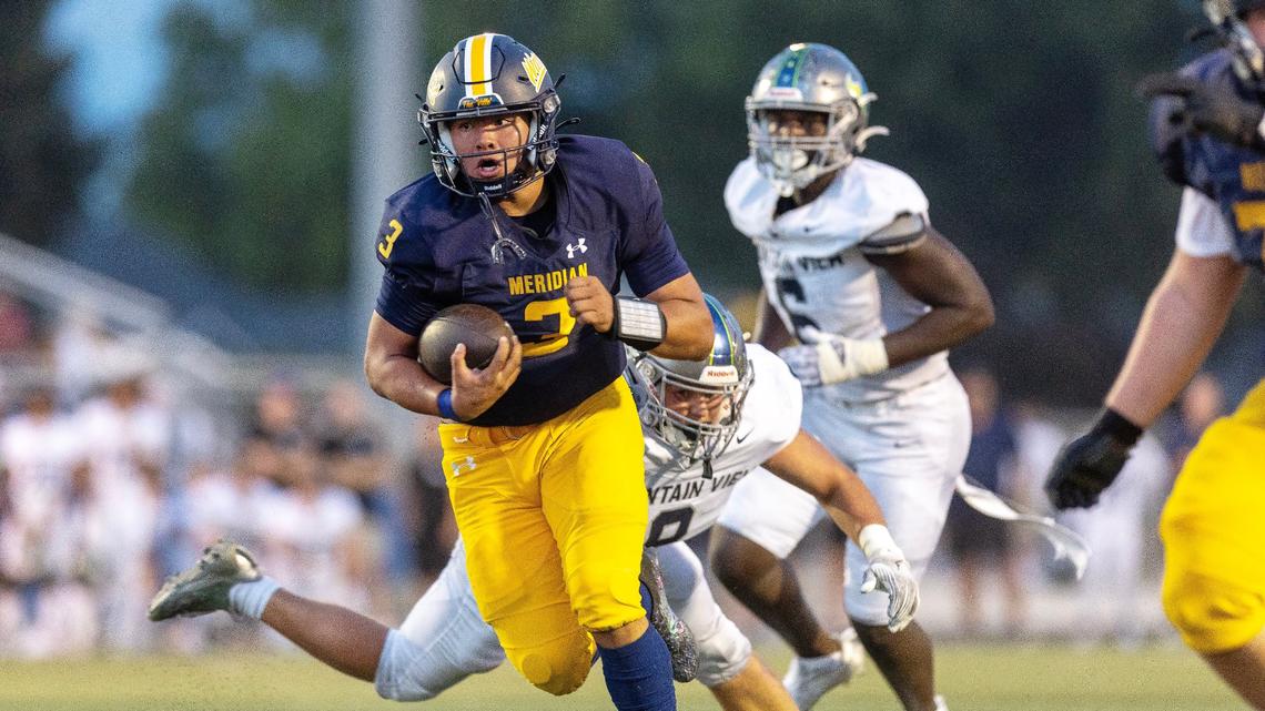 Meridian quarterback Zeke Martinez had three rushing touchdowns and three passing TDs in a 46-34 win over Mountain View on Friday at Meridian High School.