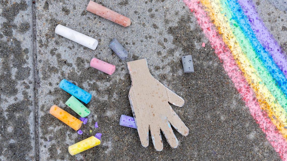 The event was a community response to the school district instructing a middle school teacher to remove classroom signs.