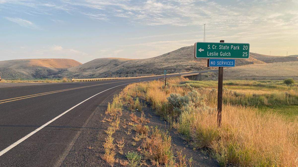 A highway sign on U.S. Highway 95 about 17 miles north of Jordan Valley indicates the turn to Succor Creek State Park. A vehicle belonging to Gwen Brunelle of Boise was parked on a pullout on the gravel road in June 2023 but she has not been found.