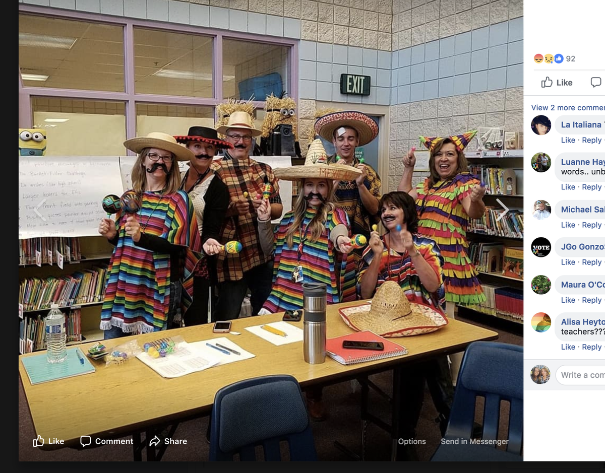 Screen shot of Heights Elementary Middleton school staff dressed for Halloween and shared on Facebook.