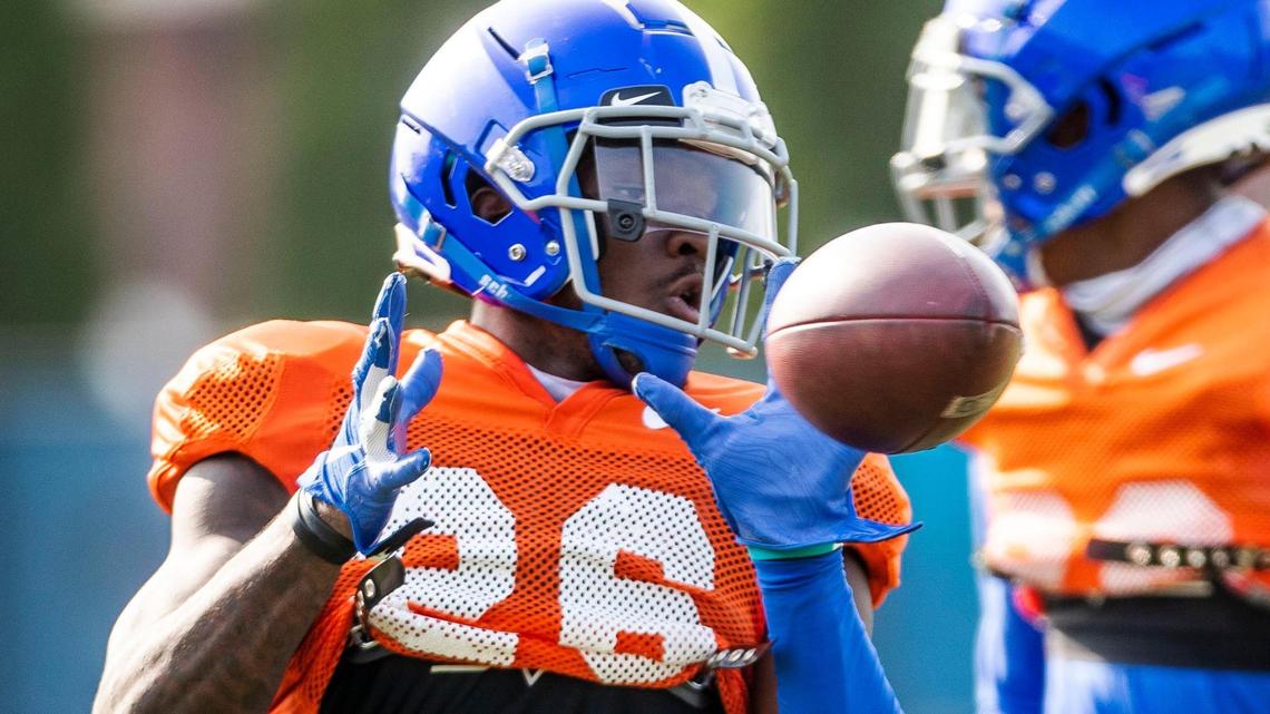 Boise State cornerback Caleb Biggers attacks a pass during fall camp drills Wednesday, Aug. 18, 2021.