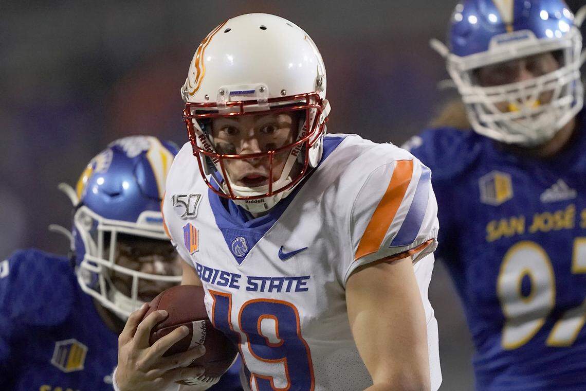 Boise State quarterback Hank Bachmeier (19) rushes for a first down against San Jose State during the second half of an NCAA college football game, in San Jose, Calif., Saturday, Nov. 2, 2019. (AP Photo/Tony Avelar)