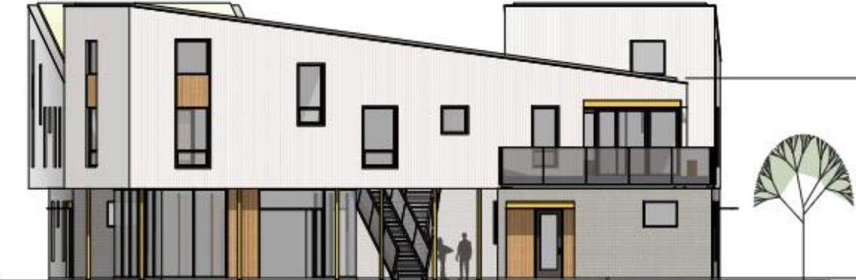 The Linder Village would include 38 apartments that would be housed in complexes like the one shown with a courtyard in the middle.